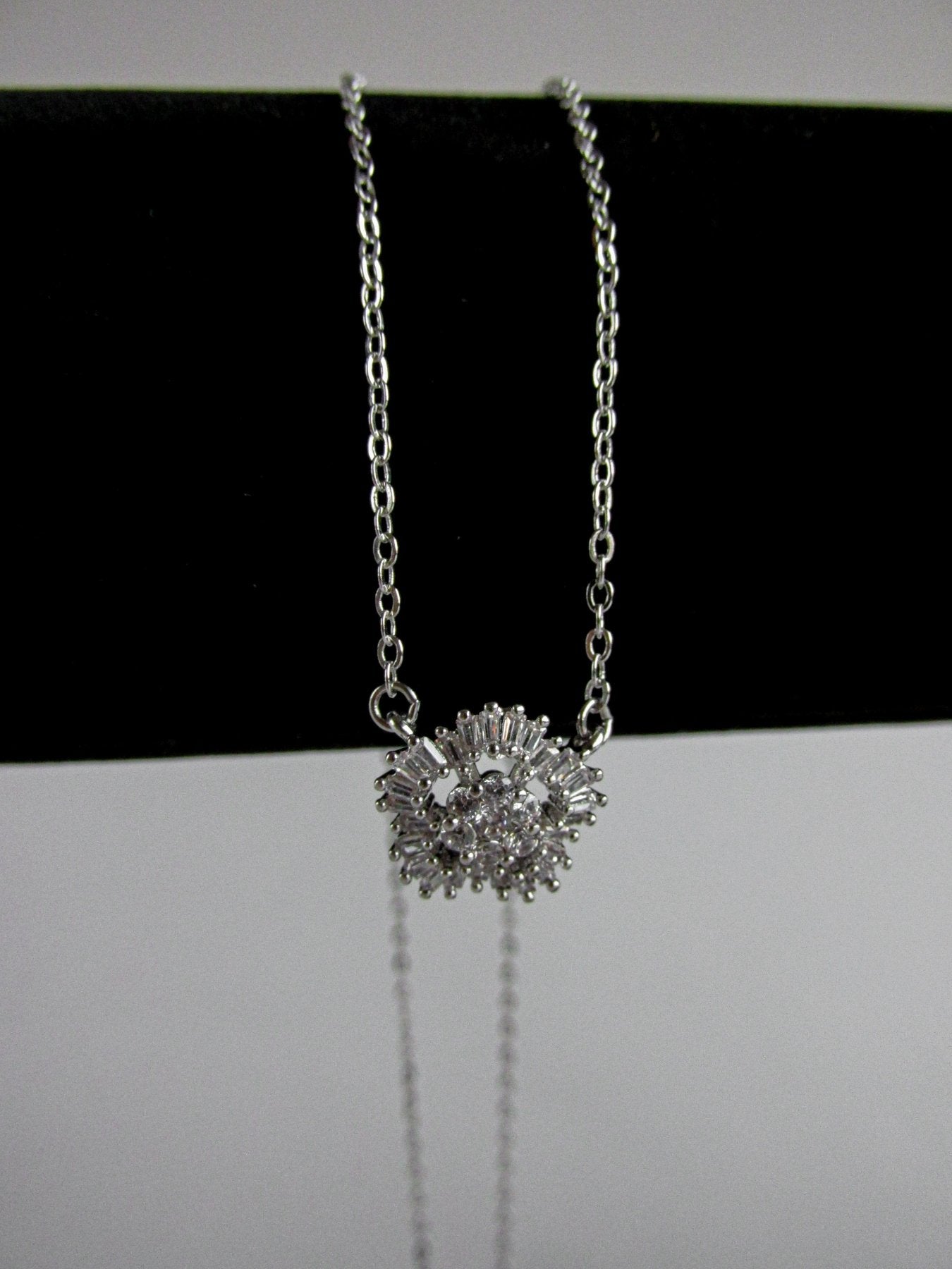 Colgante Plateado Flor - JOYAS CARATIColganteB184340